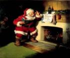 Άγιος Βασίλης διαβάζοντας ένα σημείωμα από τζάκ&amp;#9
